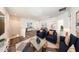Bright living room featuring hardwood floors, contemporary furnishings, and ample natural light at 300 Mitnik Dr, Deltona, FL 32738
