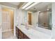 Bathroom featuring a double shower, bathtub, large vanity and a cream color scheme at 3215 Greens Ave, Orlando, FL 32804