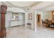 Spacious foyer with marble flooring, classic decor, and seamless transition to adjacent living spaces at 3215 Greens Ave, Orlando, FL 32804