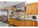 Close up of kitchen featuring stainless steel appliances, a range, and granite countertops at 3215 Greens Ave, Orlando, FL 32804