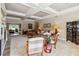 Inviting living room with coffered ceiling, comfortable seating, and view to the next room at 3215 Greens Ave, Orlando, FL 32804