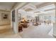 Bright living room with coffered ceilings, neutral carpet, and a cozy seating arrangement offering a relaxing atmosphere at 3215 Greens Ave, Orlando, FL 32804