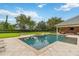 Stunning pool and spa with patio space and landscaping, ideal for outdoor living at 3215 Greens Ave, Orlando, FL 32804