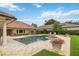 Beautiful backyard pool and spa with large patio area and lush landscaping at 3215 Greens Ave, Orlando, FL 32804