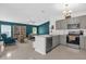Bright, open concept living space features stainless steel appliances, comfortable seating, and lots of natural light at 339 Chinaberry Ave, Oviedo, FL 32765