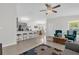 Open concept living space features a kitchen, living room, and dining area at 339 Chinaberry Ave, Oviedo, FL 32765