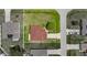 Aerial view of the property showcasing the home's layout, landscaping, and surrounding neighborhood at 442 Churchill Ct, Kissimmee, FL 34759