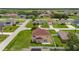 Charming two-story home featuring a well-maintained lawn and inviting curb appeal in a peaceful neighborhood at 442 Churchill Ct, Kissimmee, FL 34759