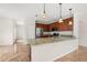 Bright kitchen features granite countertops, stainless steel appliances, and ample cabinet space at 442 Churchill Ct, Kissimmee, FL 34759