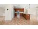 Open kitchen features stainless steel appliances and an eat-in island at 442 Churchill Ct, Kissimmee, FL 34759