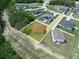 Aerial view of new construction home, showcasing the lot and surrounding area at 527 Rio Grande Dr, Poinciana, FL 34759