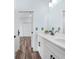Bathroom featuring double sink, quartz countertops, and modern decor at 527 Rio Grande Dr, Poinciana, FL 34759
