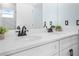 Contemporary bathroom featuring quartz countertop and dual sinks at 527 Rio Grande Dr, Poinciana, FL 34759