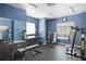 Well-equipped fitness center with free weights, Hoist weight machines, mirrors, and rubber flooring at 5467 Vineland Rd # 6110, Orlando, FL 32811