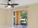 View from bedroom of screened-in patio with view of the outdoors at 5467 Vineland Rd # 6110, Orlando, FL 32811