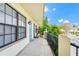 Cozy balcony with blue doors and lush green views at 6052 Village Cir # 6052, Orlando, FL 32822