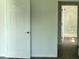 Hallway view to a bathroom with a shower and a toilet at 611 Amazon Pl, Kissimmee, FL 34759
