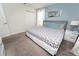 Cozy bedroom features a stylish bed, and natural light, creating a restful atmosphere at 9014 Stinger Dr, Davenport, FL 33896