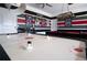 Game room with an air hockey table and a pool table under a hanging light at 9014 Stinger Dr, Davenport, FL 33896