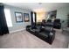 Spacious media room featuring multiple rows of theater seating at 9014 Stinger Dr, Davenport, FL 33896