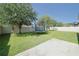 Large fenced backyard includes a trampoline and offers plenty of space for recreation at 9257 Outlook Rock Trl, Windermere, FL 34786