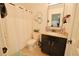 Bathroom featuring a modern vanity, tile flooring, and a shower and tub at 9257 Outlook Rock Trl, Windermere, FL 34786