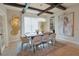 Dining room features large table, decorative lighting, and stylish decor at 9257 Outlook Rock Trl, Windermere, FL 34786