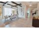 Open-concept dining area featuring designer lighting, decor, and easy access to the kitchen and living spaces at 9257 Outlook Rock Trl, Windermere, FL 34786