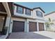 Three car garage of home with pavers at 9257 Outlook Rock Trl, Windermere, FL 34786