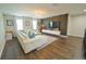 Elegant living room with wood accent wall and recessed lighting at 9257 Outlook Rock Trl, Windermere, FL 34786