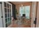 Office space with modern desk and large window offering natural light at 9257 Outlook Rock Trl, Windermere, FL 34786