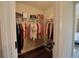 Open walk-in closet with shelving and ample storage space at 9257 Outlook Rock Trl, Windermere, FL 34786