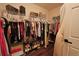 Spacious walk-in closet with ample storage and organization at 9257 Outlook Rock Trl, Windermere, FL 34786
