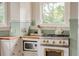 A close up of the stove and counter space at 1008 Delaney Park Dr, Orlando, FL 32806