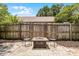 Cozy backyard featuring a fire pit, chairs, and privacy fencing at 103 Gleason Cv, Sanford, FL 32773