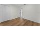 Bedroom featuring wood-look flooring and a closet at 103 Gleason Cv, Sanford, FL 32773
