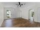 The living room features laminate floors, high ceilings, and natural light at 103 Gleason Cv, Sanford, FL 32773