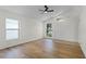 Living room with laminate floors, a ceiling fan, and great natural light at 103 Gleason Cv, Sanford, FL 32773
