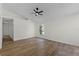 The living room features laminate floors and a ceiling fan at 103 Gleason Cv, Sanford, FL 32773