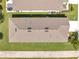 Aerial view of the home showcasing roof details, landscaping, and the surrounding neighborhood at 115 Duchess Rd, Deland, FL 32724