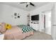This bedroom has a well-lit interior with a comfortable bed and modern storage solutions at 115 Duchess Rd, Deland, FL 32724