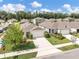 Charming single-story home featuring a well-manicured lawn, an attached two-car garage, and a welcoming facade at 115 Duchess Rd, Deland, FL 32724