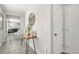 Bright hallway showcases stylish decor, tile flooring, and seamless transition to a comfortable living area at 115 Duchess Rd, Deland, FL 32724