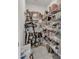 Walk-in pantry featuring wire shelving providing ample storage for food, small appliances, and kitchen necessities at 115 Duchess Rd, Deland, FL 32724