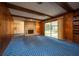 Living room features a brick fireplace and sliding doors to the outside at 1171 Covewood Trl, Maitland, FL 32751