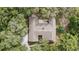 An aerial view showcasing the roof and surrounding mature trees at 137 Hickory Ridge Cir, Lake Mary, FL 32746