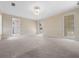 Spacious bedroom with neutral carpet, paint and natural light at 137 Hickory Ridge Cir, Lake Mary, FL 32746