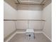 A closet with shelves, a safe, and carpet at 137 Hickory Ridge Cir, Lake Mary, FL 32746