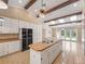 Spacious kitchen with a large island, wood countertops, and plenty of cabinet space at 137 Hickory Ridge Cir, Lake Mary, FL 32746