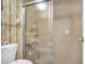 Bathroom boasts a shower stall, neutral tile, and classic design at 14 Escondido Ct # 134, Altamonte Springs, FL 32701
